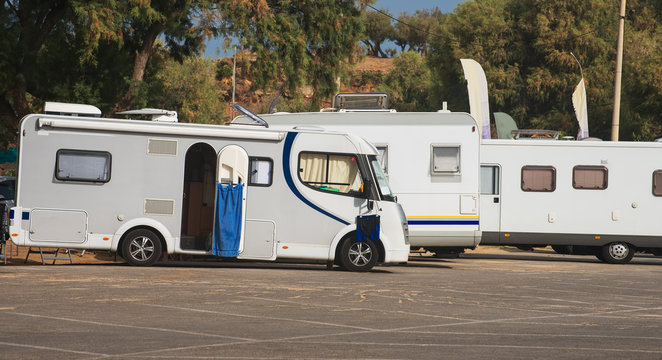 RV Camping. Three recreational vehicles.