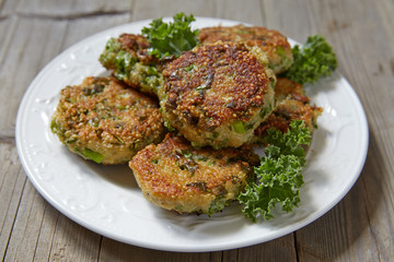 Quinoa fritters with kale and cheddar