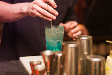 Barman stir alcohol 