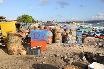 Baskets and boats in the fishing area