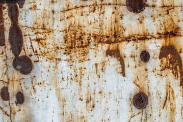 surface of rusty iron with remnants of old paint background