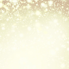 Gold sparkles - Christmas Defocused Lights Background with winte
