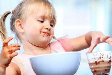 Three year old at breakfast.