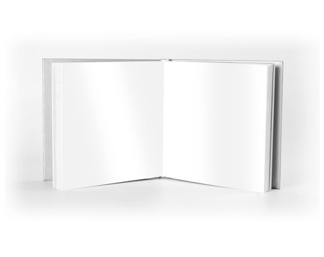 Blank open book standing over white background.