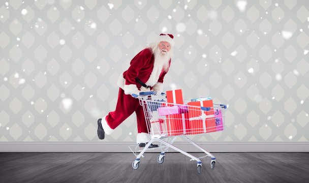 Composite Image Of Santa Pushing Shopping Cart