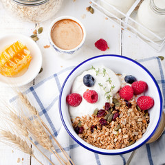 Healthy breakfast. Granola with pumpkin seeds, honey, yogurt ,fresh berries.