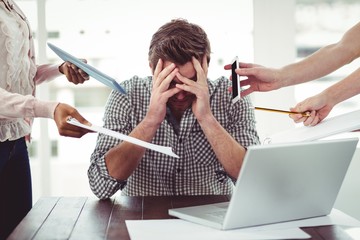 Businessman stressed out at work - obrazy, fototapety, plakaty