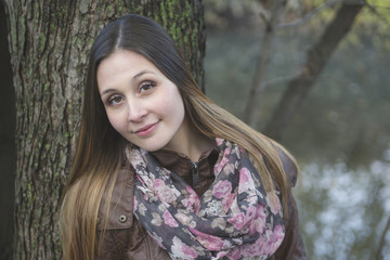Fototapeta premium Beautiful autumn woman in golden park