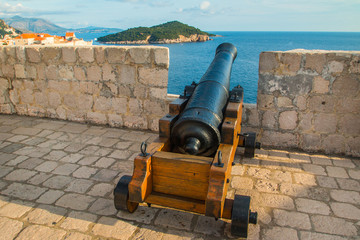 Fototapeta na wymiar Cannon on the walls of defensive fortress Lovrijenac, old town of Dubrovnik, Croatia 