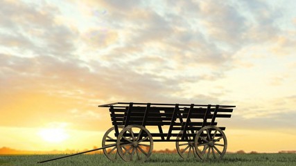 Ancient wooden cart on grass surface and sky background