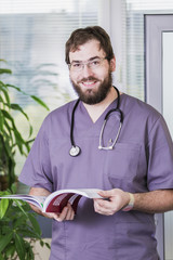 male doctor with book