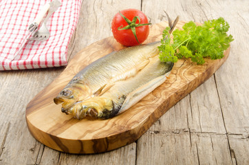 smoked kipper with tomato and parsley