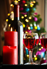 glasses of red wine with Christmas decoration