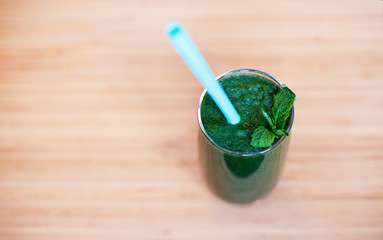 Green healthy smoothie with spinach, green apple and celery