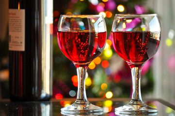 glasses of red wine with Christmas decoration