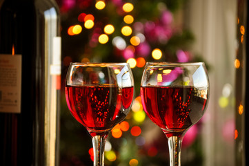 glasses of red wine with Christmas decoration