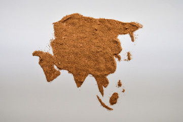 Nutmeg in the shape of the continent of Asia © Matthias De Boeck