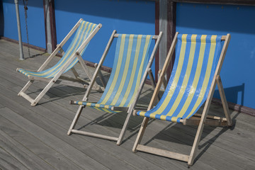 Three Blue and Yellow Deckchairs