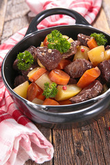 beef stew with wine sauce and vegetables