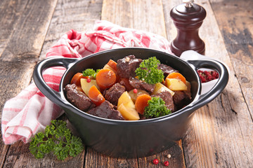 beef stew with wine sauce and vegetables