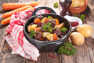 beef stew with wine sauce and vegetables