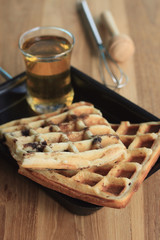 tasty waffle with honey