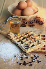 tasty waffle with honey