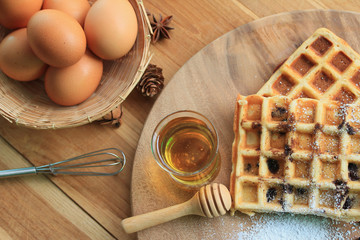 tasty waffle with honey
