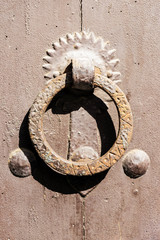 Vintage iron handle on old door