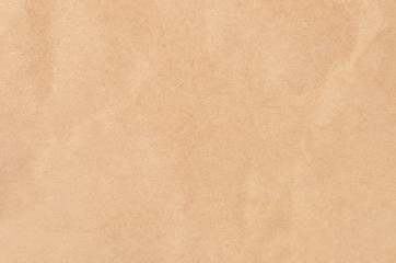 Wrinkled packaging paper background, close up, DOF