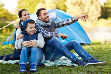Fototapeta premium happy family with tent at camp site