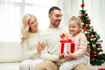 happy family at home with christmas gift box