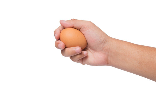 hand holding an egg isolated on white