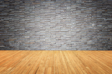 Empty top of wooden floor and natural stone wall