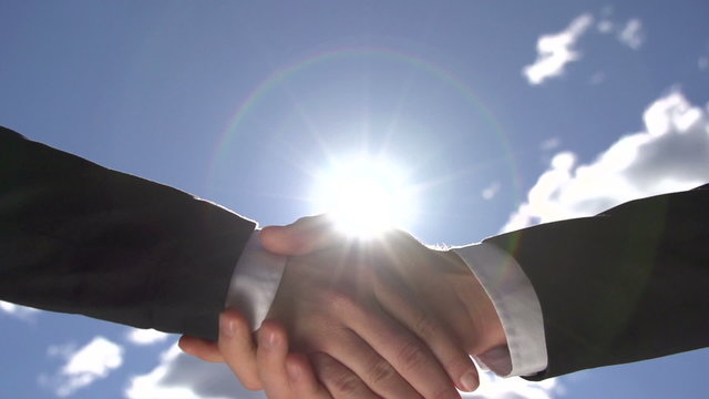 Handshake over the sun