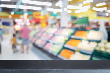 Obraz premium Empty top of natural stone table and blur with bokeh background
