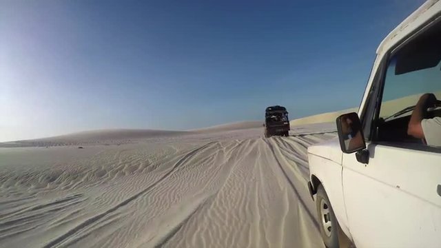 Off Road Jeeps Driving Through Desert