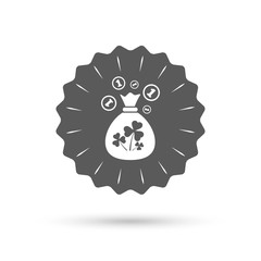 Money bag with three leaves clovers sign.