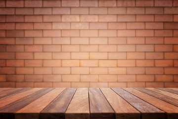 Empty top wooden table and stone wall background