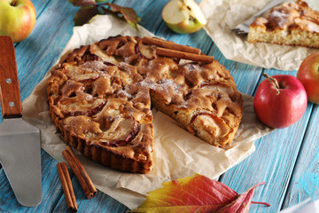 Homemade apple cake on blue wooden table