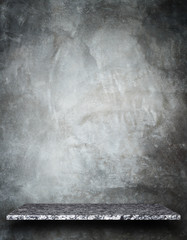 Fototapeta premium Empty top of natural stone shelves and stone wall background