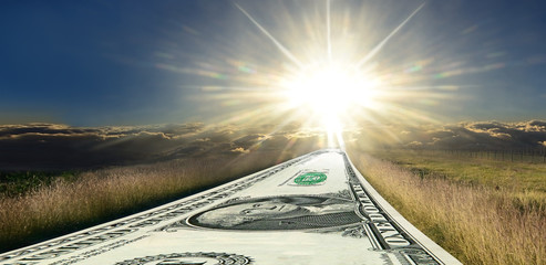 Money road to success. Sunrise panorama. 1 (one) USD as the road to success. The beautiful...