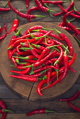 Red hot chili peppers on the wooden table