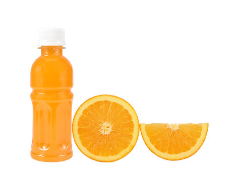 Orange fruit with Orange juice in a bottle isolated on white