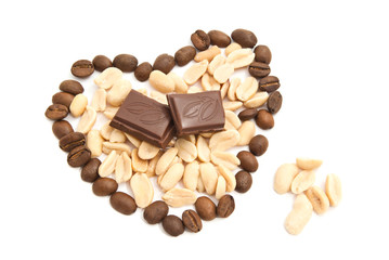 heart of coffee beans, peanuts and chocolate on white