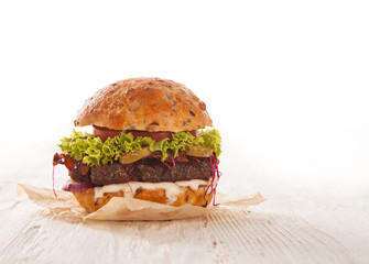 Delicious hamburger on wood