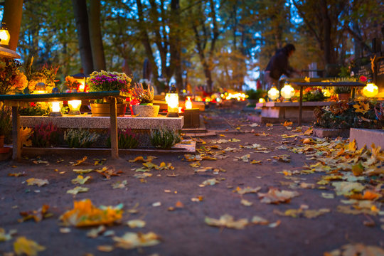 Colorful candles on the cemetery at All Saints Day, Poland
