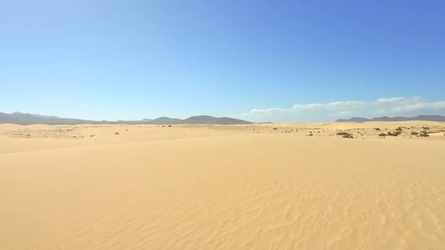 AERIAL: Flying above the endless sandy desert