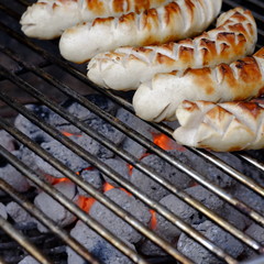 bratwurst on charcoal grill