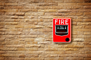 fire break glass alarm switch on the wall